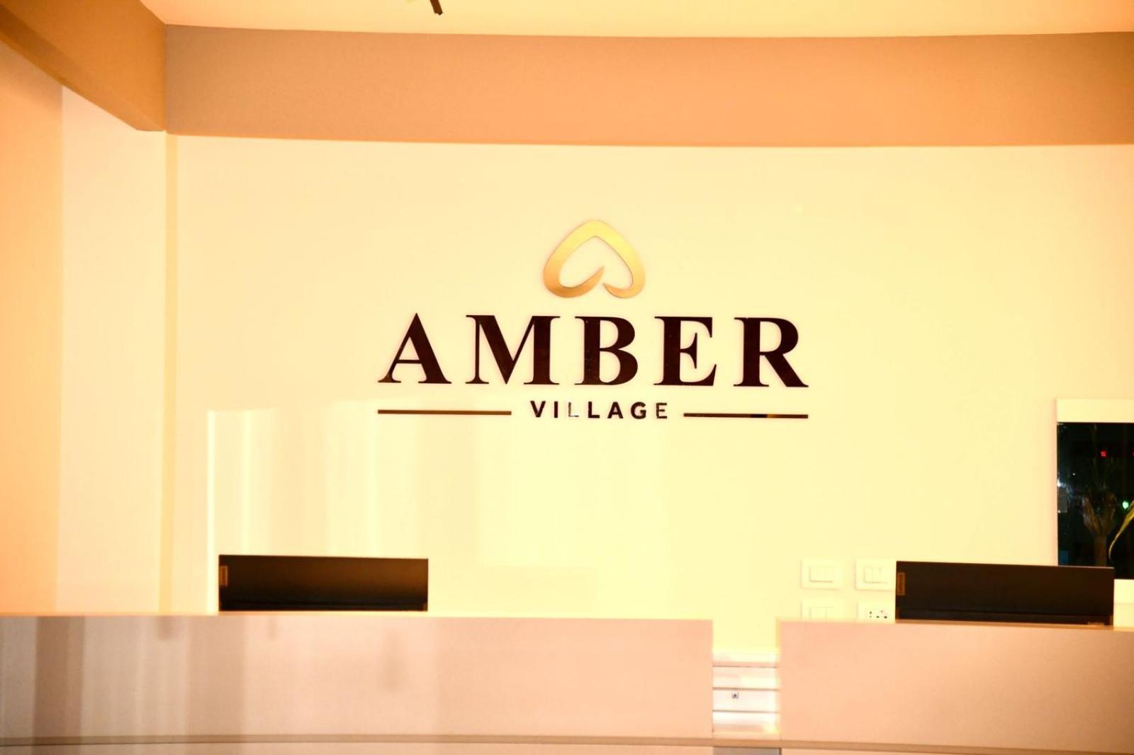 Amber Village Spille Buitenkant foto